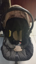 Baby infant car seat in black and beige with canopy and 5-point harness